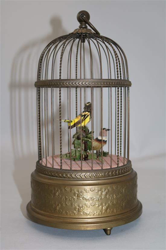 A mid 20th century musical brass birdcage automaton by Reuge Music, Saint-Croix, Switzerland, 11.25in.